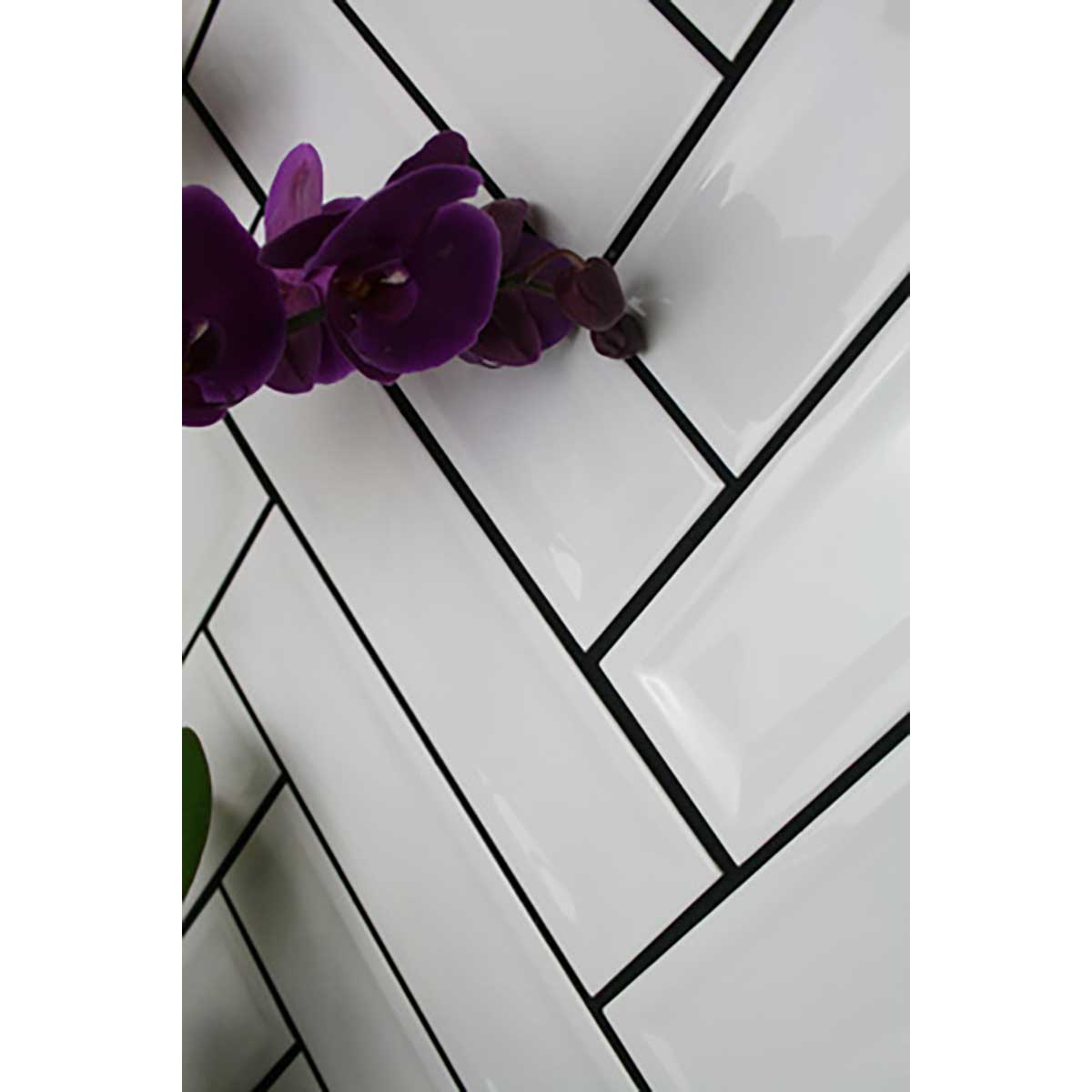 White Glossy Ceramic Groove Wall Tile with Waterfall Glaze Finish close up with purple floor