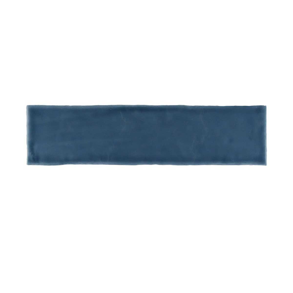 Glossy blue ceramic subway tile with handcrafted Spanish artisan character