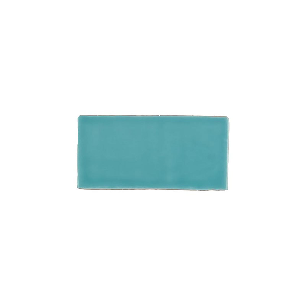 Glossy turquoise blue ceramic subway tile with handcrafted Spanish artisan texture
