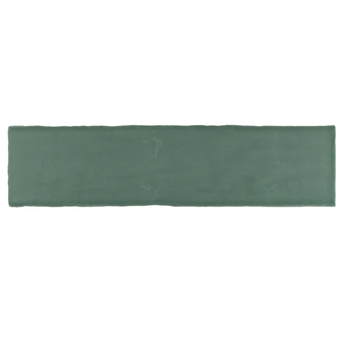 Glossy green ceramic subway tile with handcrafted Spanish artisan detailing