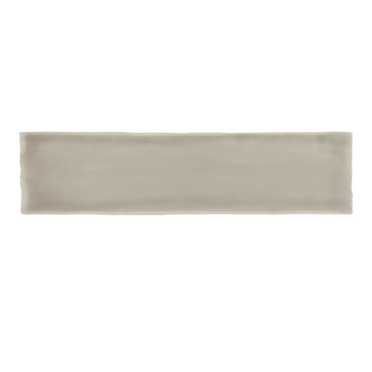 Glossy taupe ceramic subway tile with handcrafted Spanish artisan detailing