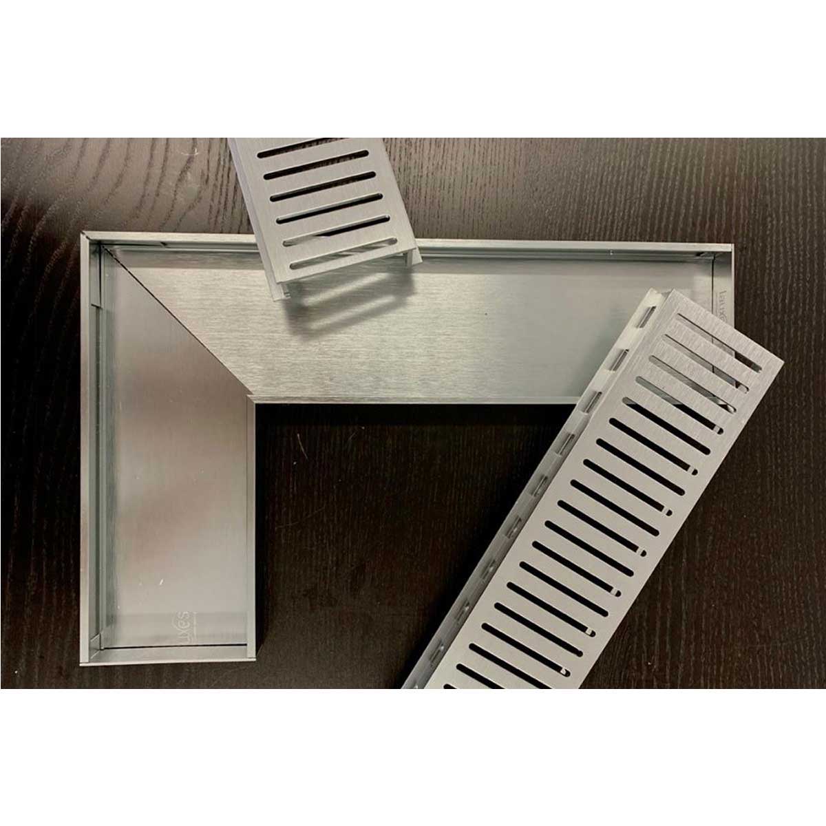 Lauxes Grates 90 degree joiners - on a wooden floor