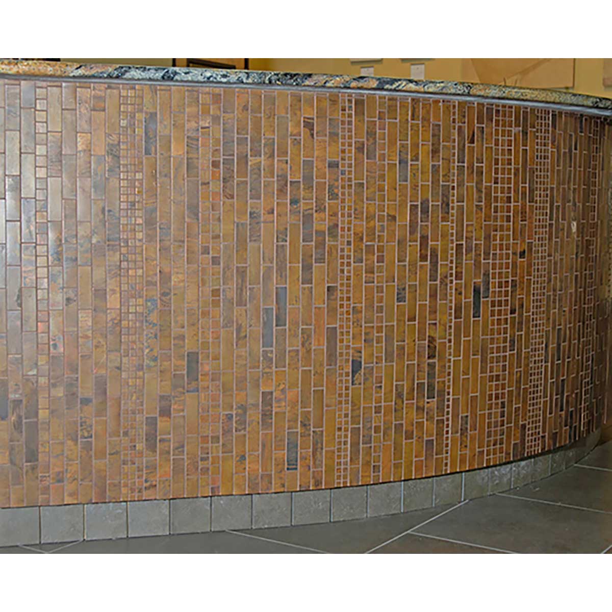 Antique Copper Metal Tile Backsplash installed on a wall