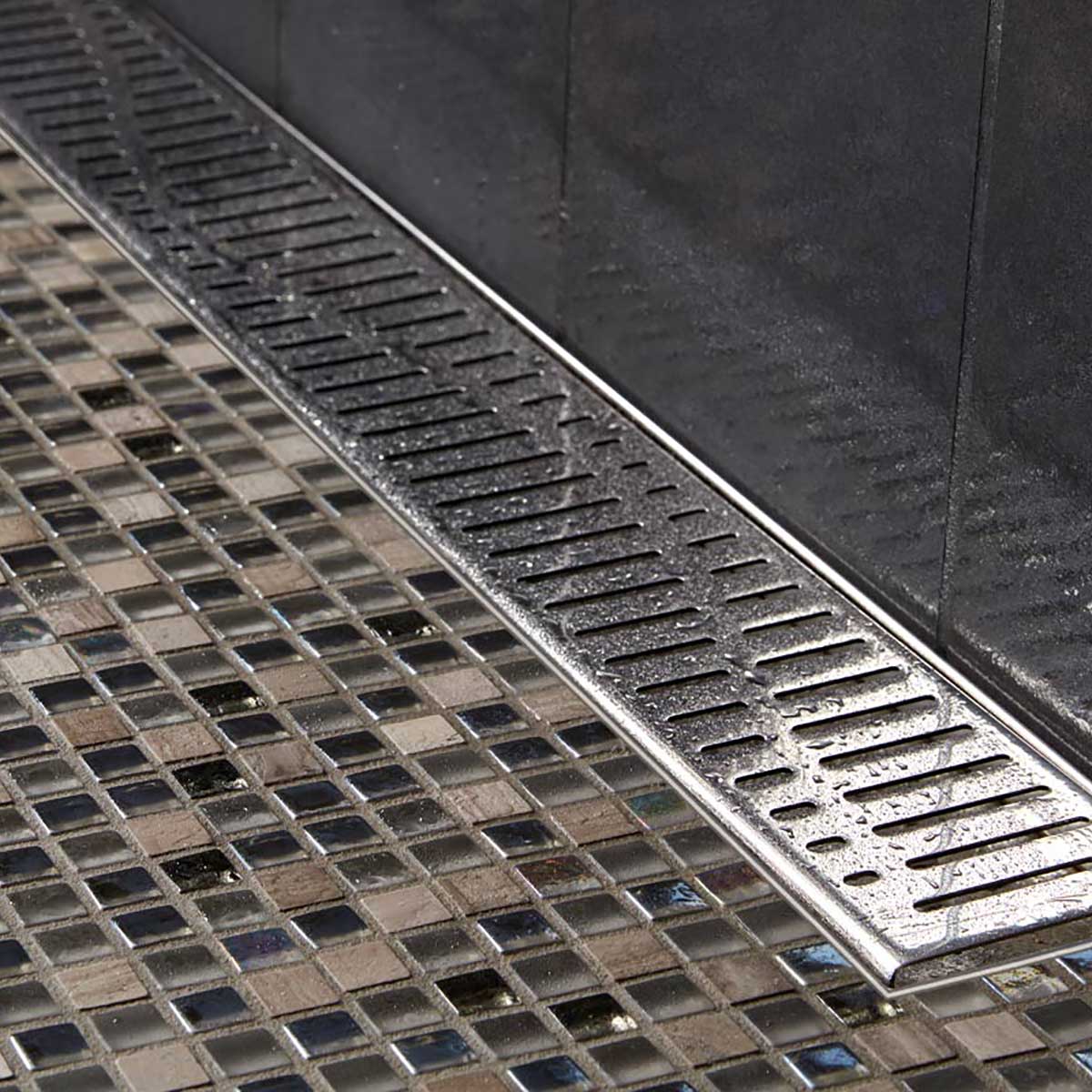 Stainless steel Quartz Wave shower drain featuring a mirror-like Polished Chrome finish