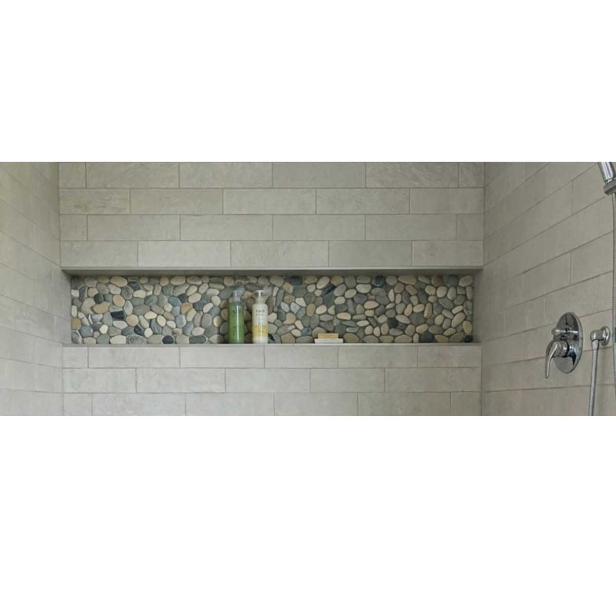 Oversized 16 x 72 shower niche in a custom tile shower