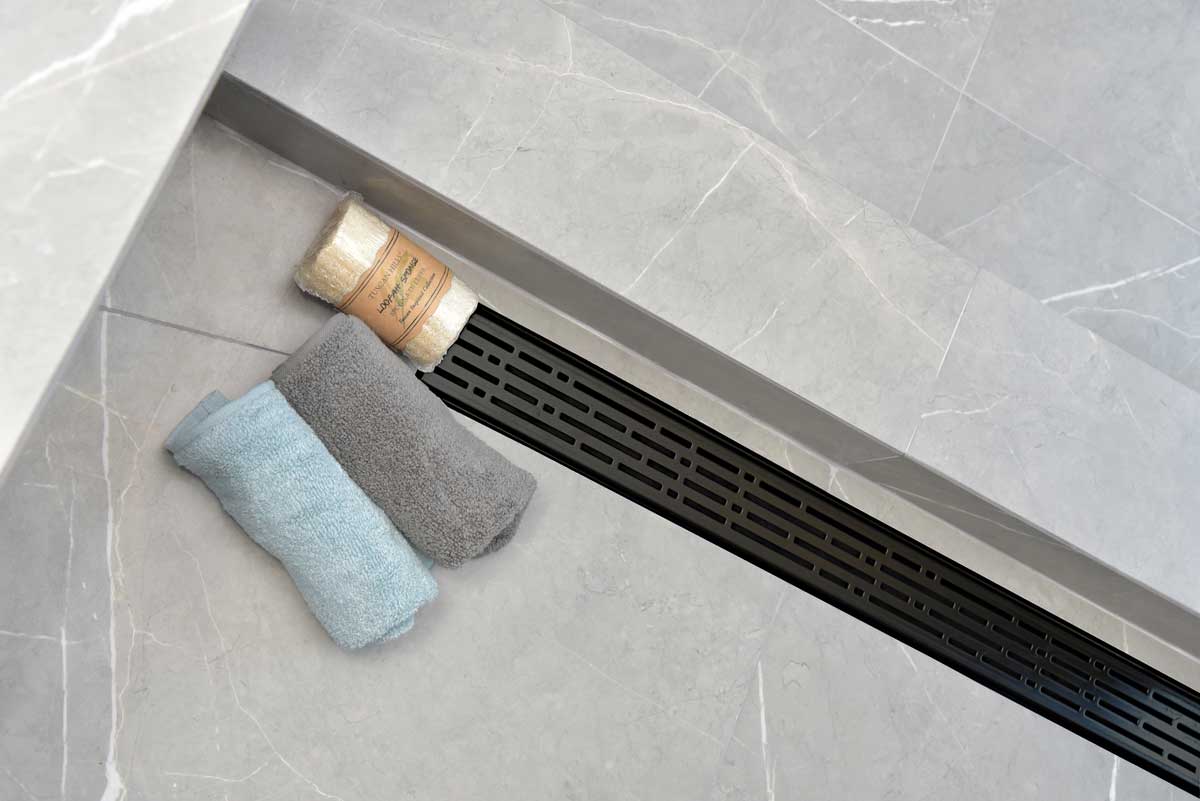 SereneDrains Wow Drain TM Side Discharge Outlet with Linear Shower Drain Horizontal Low Profile