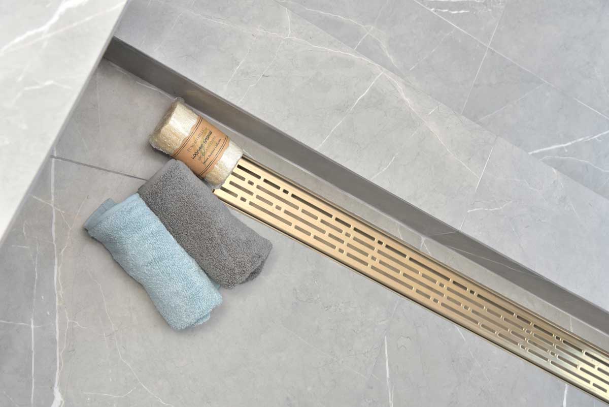 SereneDrains Wow Drain TM Side Discharge Outlet with Linear Shower Drain Horizontal Low Profile