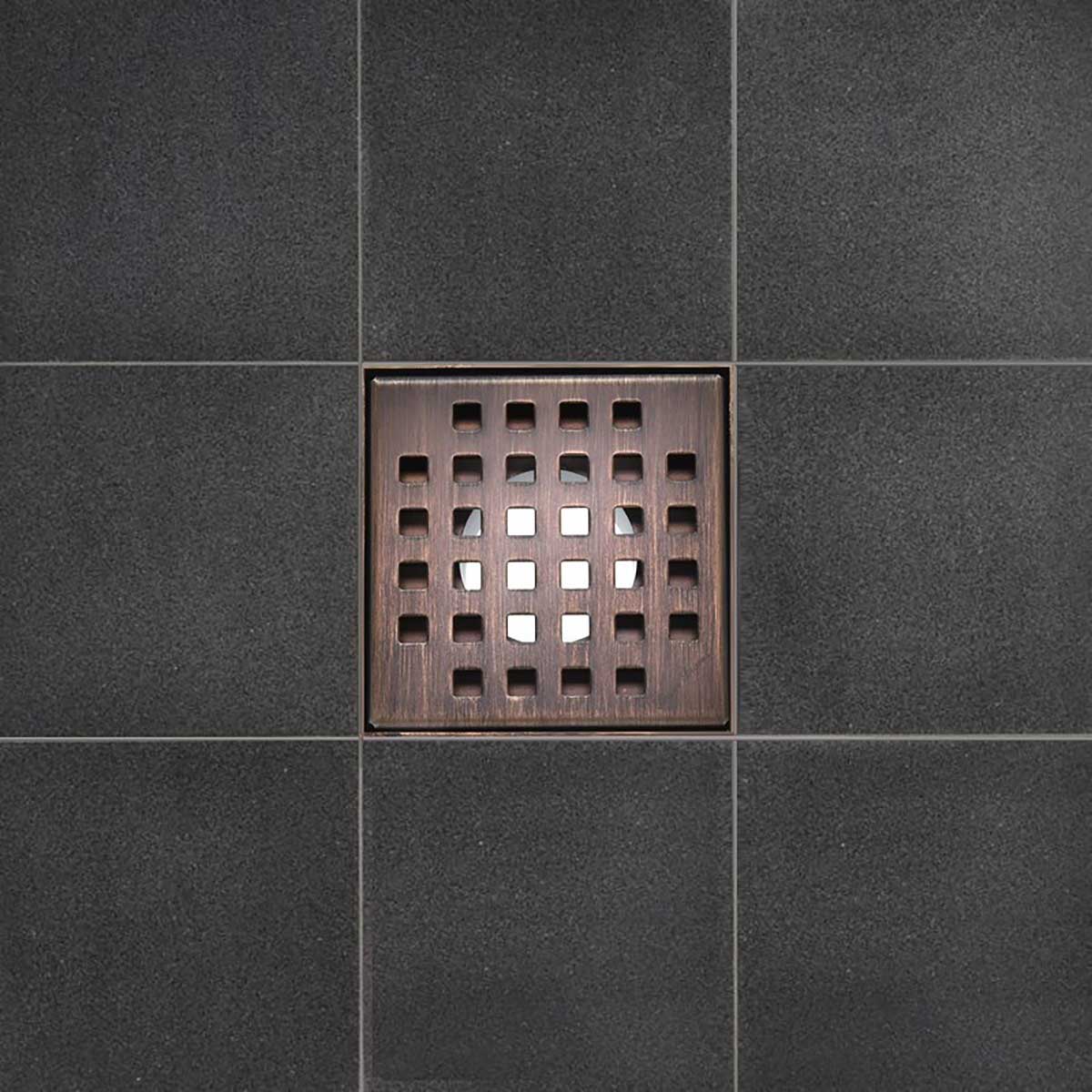 Serene Square Drain in Bronze over porcelain tile floor