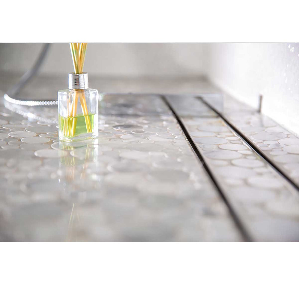 SereneDrains Linear Shower Drain Tile Insert Brushed Nickel over mosiac penny round porcelain tile