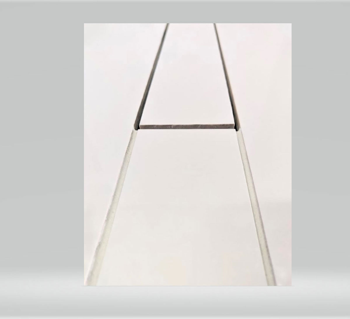Modern walk-in shower with concealed floor drain