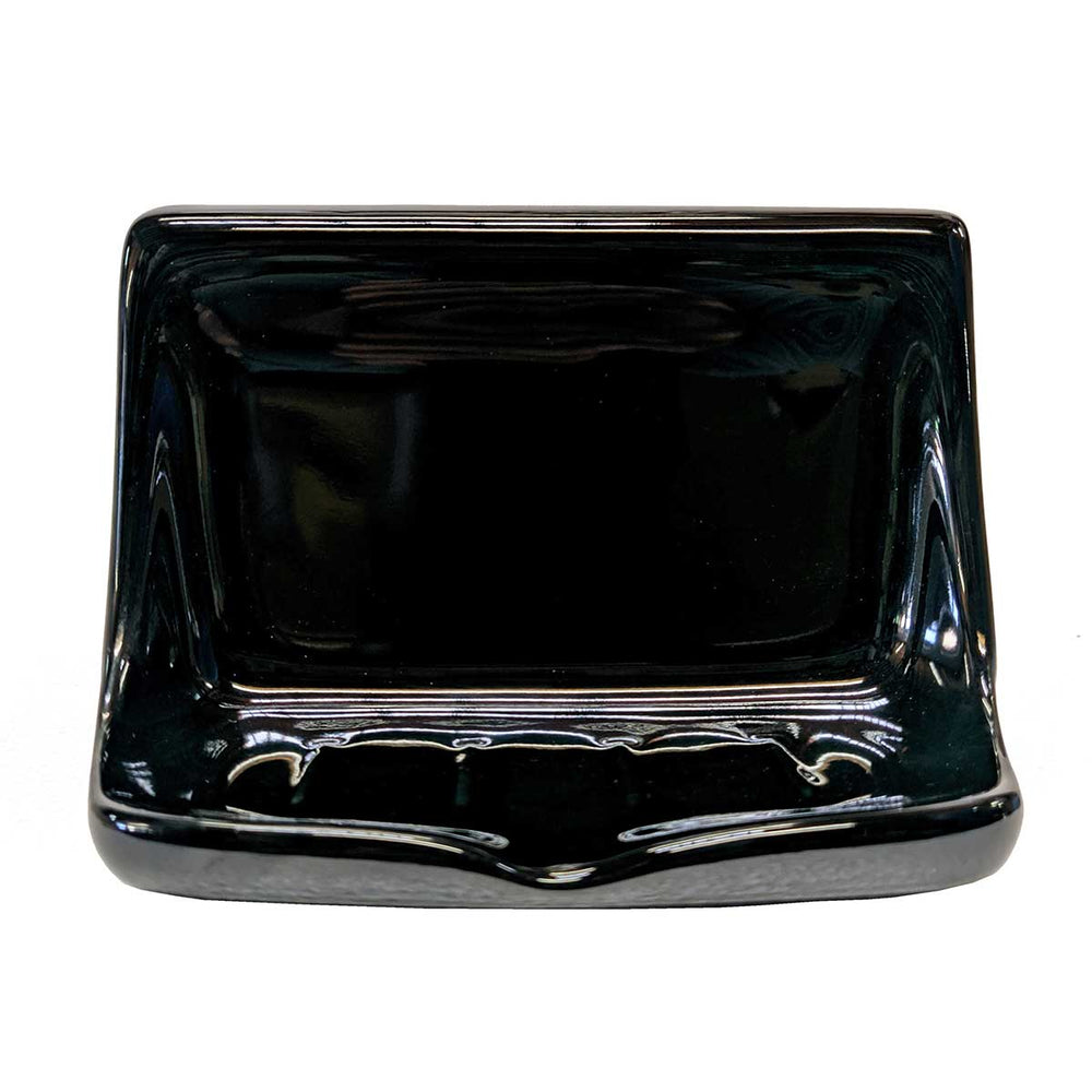 Porcelain soap dish in glossy black on a white background