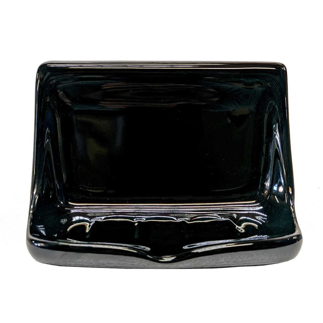 Porcelain soap dish in glossy black on a white background