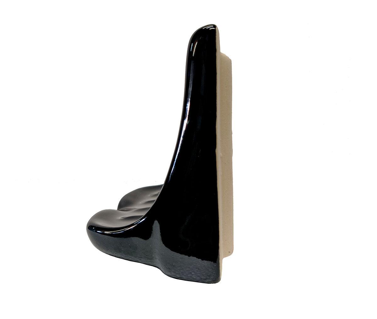 Porcelain soap dish in glossy black on a white background