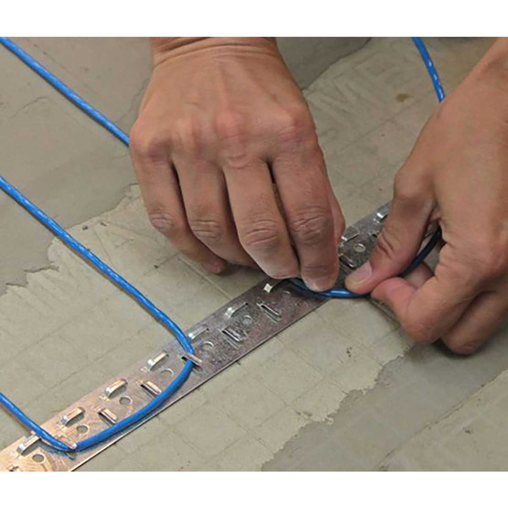 SunTouch WarmWire Radiant Floor Heating Spool with underlayment mat install using metal straps