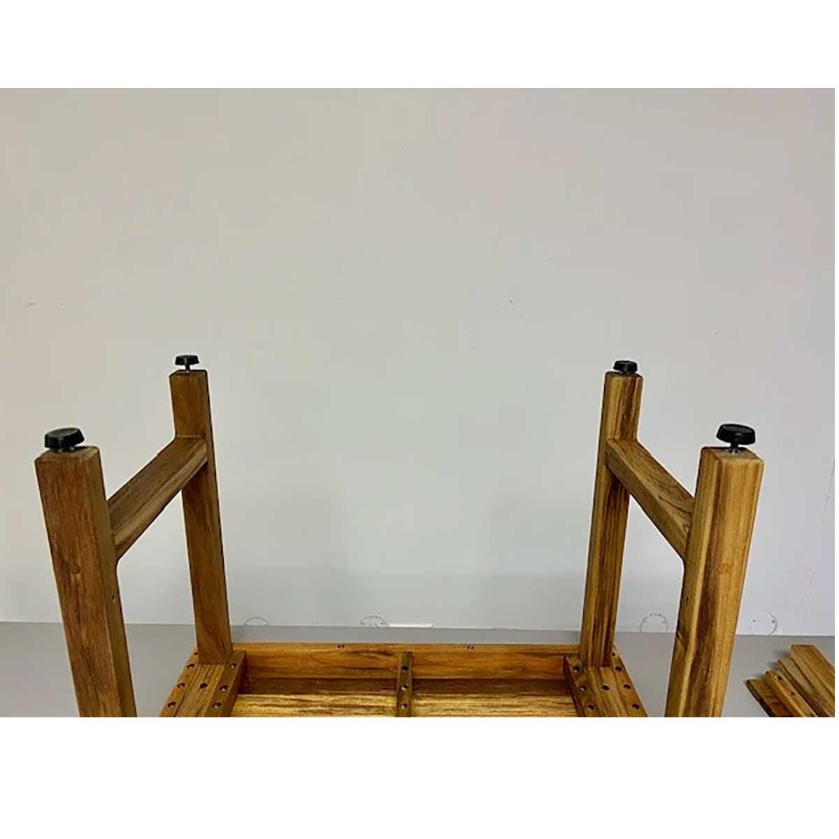 Removable storage shelf on teak shower bench