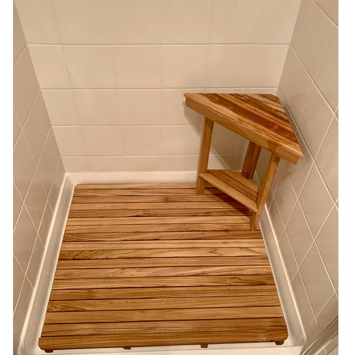 Compact teak shower seat in corner bathroom layout