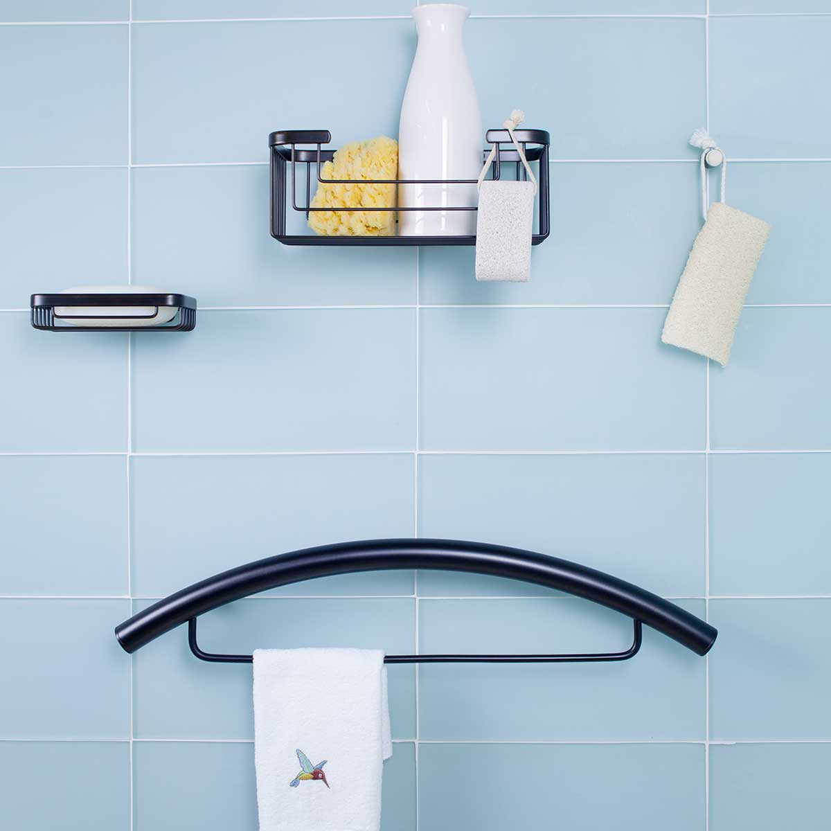 TileWare Promessa Rectangular Soap Basket with Towel bar on a blue tile wall