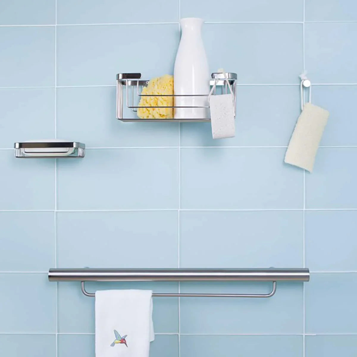 TileWare Promessa Rectangular Soap Basket with Towel bar on a blue tile wall