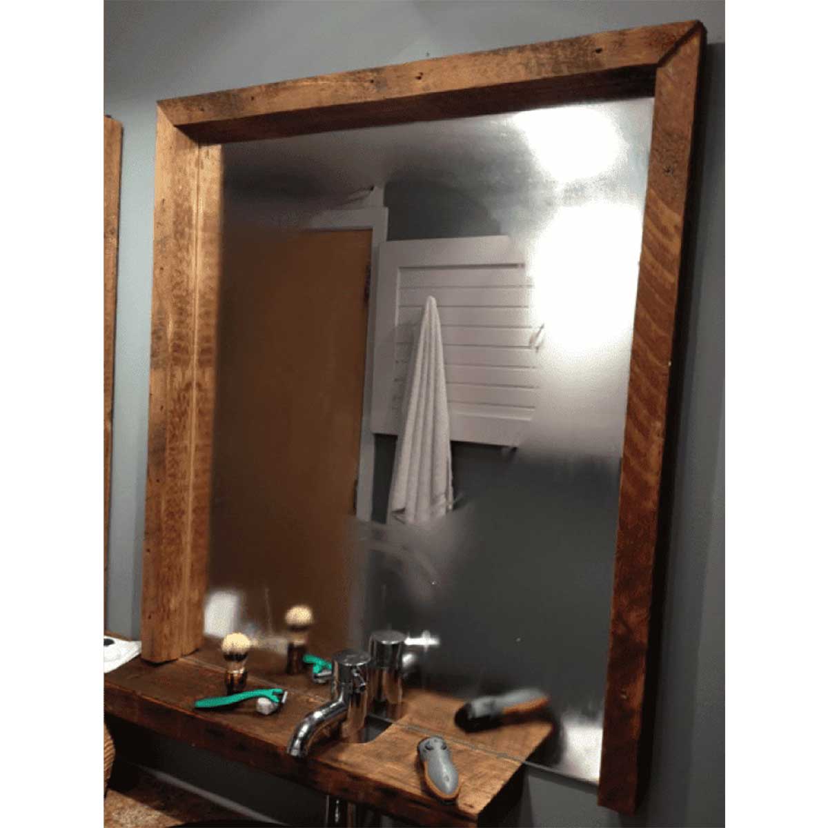 Warmup Mirror Defoggers Pad Installed behind a mirror