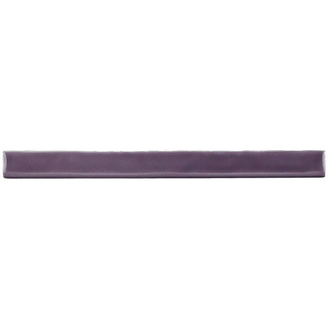 Glossy bordeaux ceramic bullnose trim tile with handcrafted Spanish detailing