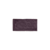 Glossy bordeaux ceramic subway tile with handcrafted Spanish artisan appeal