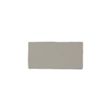 Glossy caramel ceramic subway tile with handcrafted Spanish artisan character