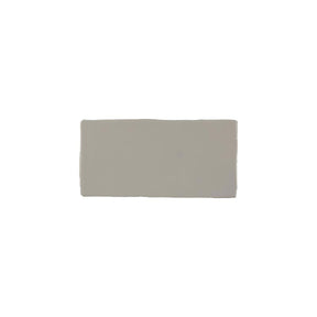 Glossy caramel ceramic subway tile with handcrafted Spanish artisan character
