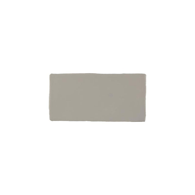 Glossy caramel ceramic subway tile with handcrafted Spanish artisan character