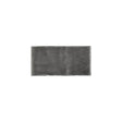 Glossy dark grey ceramic subway tile with handcrafted Spanish artisan texture