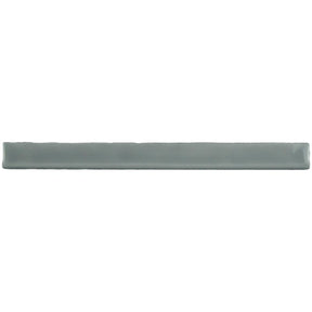 Glossy grey ceramic bullnose trim tile with handcrafted Spanish artisan detailing