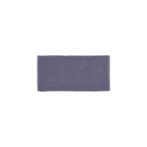 Glossy lavender ceramic subway tile with handcrafted Spanish artisan detailing