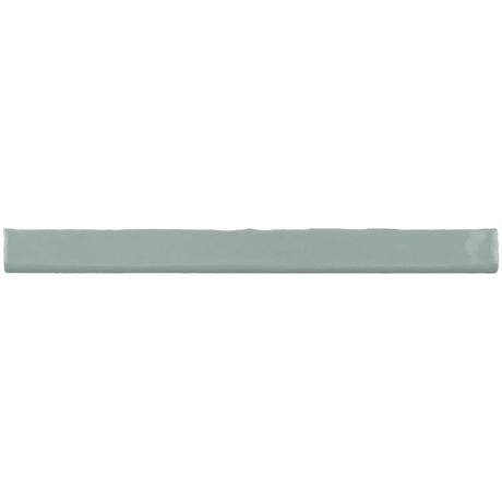 Glossy light blue ceramic subway tile with handcrafted Spanish artisan detailing