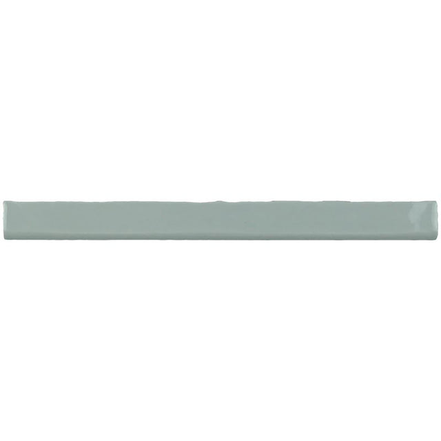 Glossy light blue ceramic subway tile with handcrafted Spanish artisan detailing