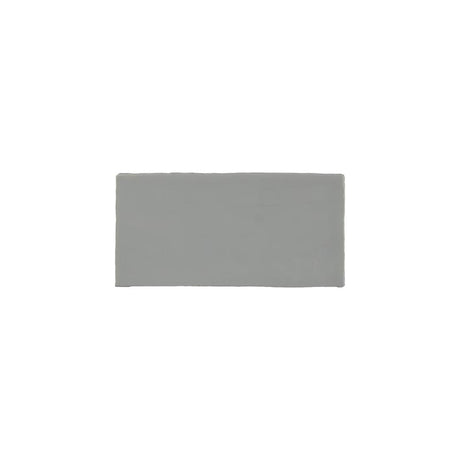 Glossy light blue ceramic subway tile with handcrafted Spanish artisan detailing