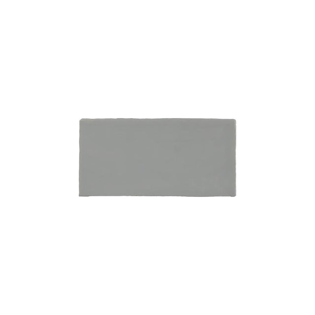 Glossy light blue ceramic subway tile with handcrafted Spanish artisan detailing