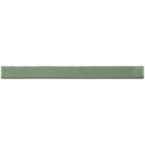 Glossy pistachio ceramic bullnose trim tile with handcrafted Spanish artisan detailing