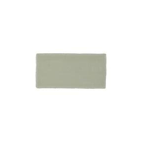 Glossy pistachio ceramic subway tile with handcrafted Spanish artisan detailing