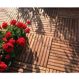 African teak wood floor mat installed on an outdoor patio