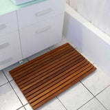 African teak shower mat in modern bathroom