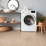 White washing machine in a laundry room with a shelf and Alhambra Series Tessina 8x8 Deco Porcelain Tile