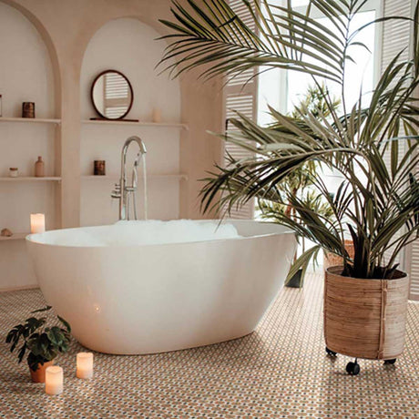 Modern bathroom with a freestanding bathtub, plants, and Alhambra Series Tessina 8x8 Deco Porcelain Tile