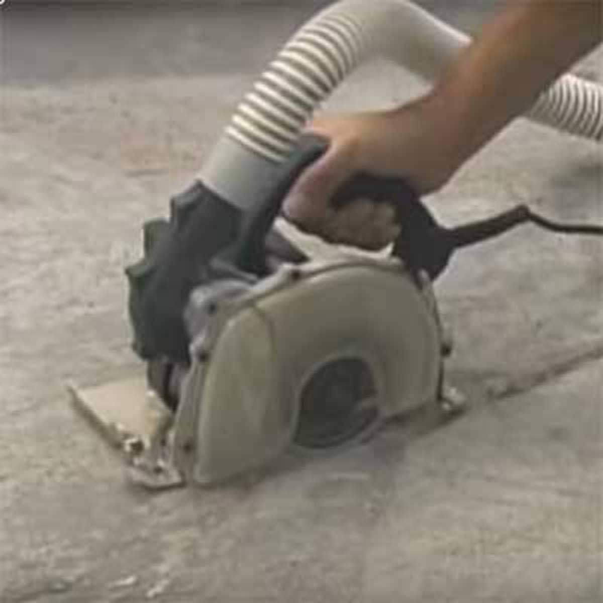 Alpha EcoCutter cutting porcelain tile with minimal dust