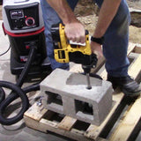 Professional using an Alpha diamond core bit to drill a stone countertop