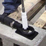 Alpha Professional Tools laser segmented diamond core bit drilling into a brick wall