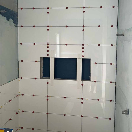 ATR Tile Leveling System use in a Shower walls showing the spindles attached in a Cross Pattern