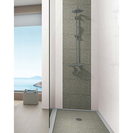 Modern shower area with Hexagon Porcelain Mosaic Tile - Sage Green and view of water.