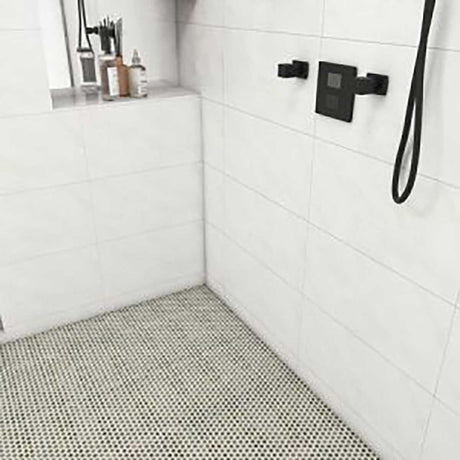 Modern shower setup with black fixtures on Penny Round Porcelain Mosaic Tile - Sage Green