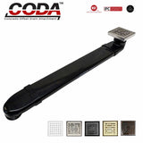 CODA-B shower drain relocator installed with brushed nickel square shower drain