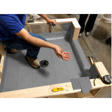 Custom cut shower pan membrane for residential bathroom remodels