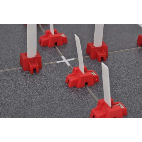 DTA leveling spacers for large format tile installation
